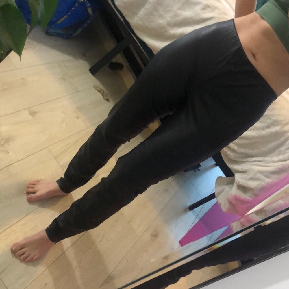 Leather pants size 7 with zips at the bottom